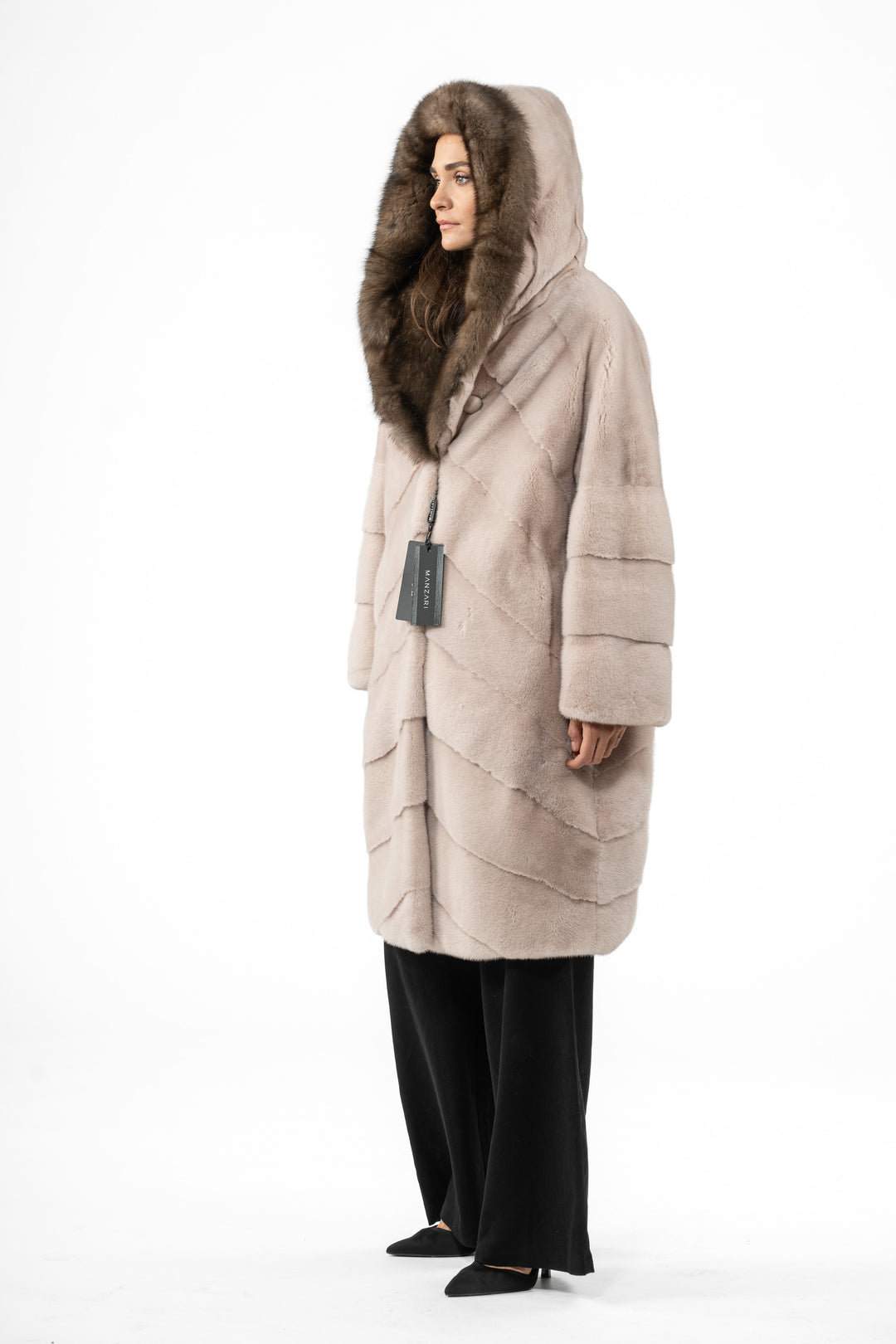 Model wearing a Powder Mink fur coat