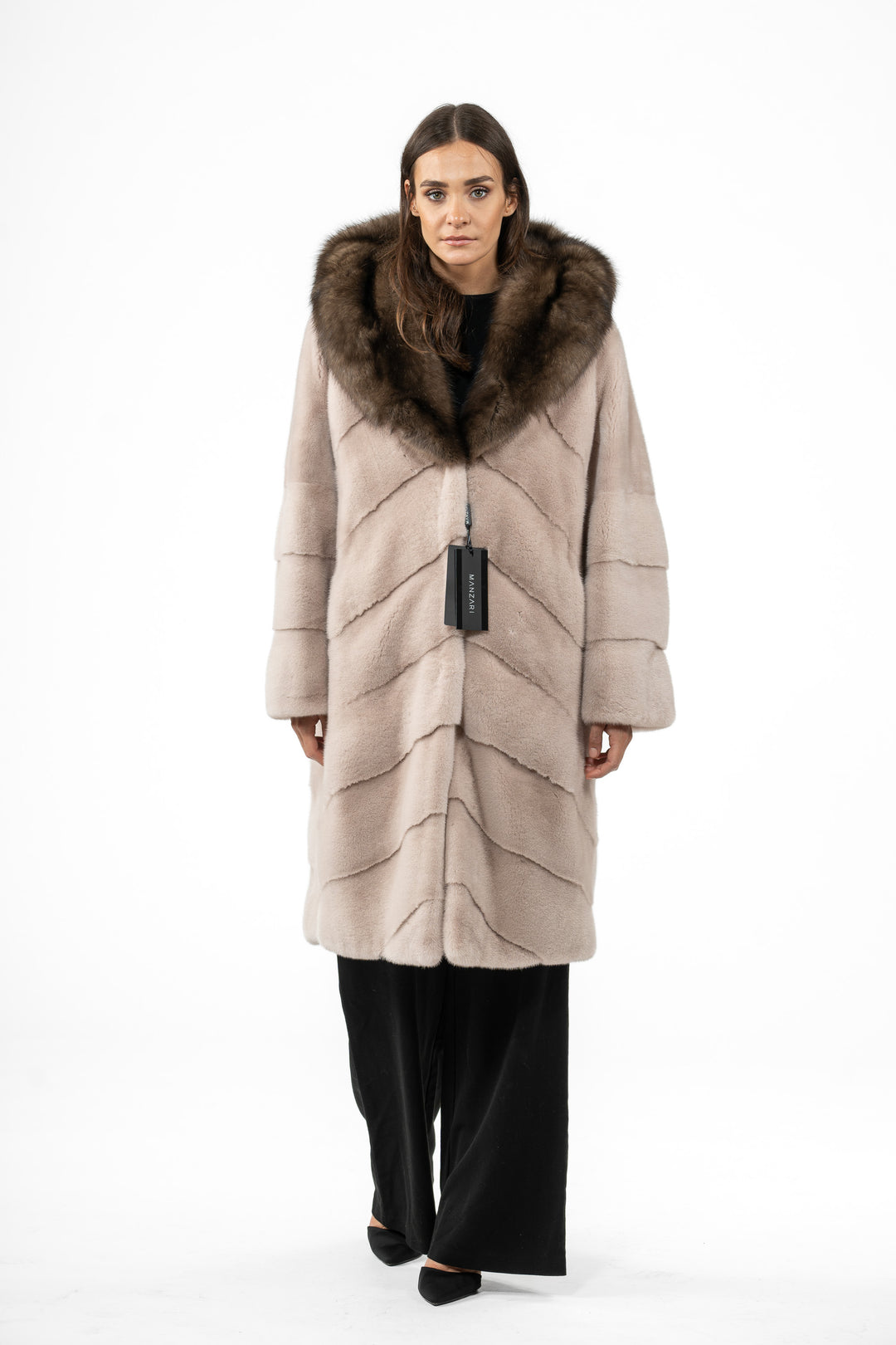 Model wearing a Powder Mink fur coat