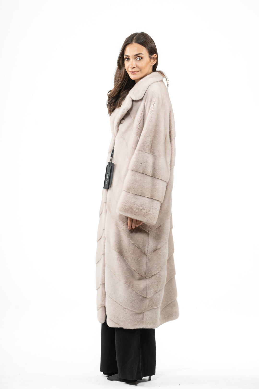 Model wearing a Powder Mink fur coat