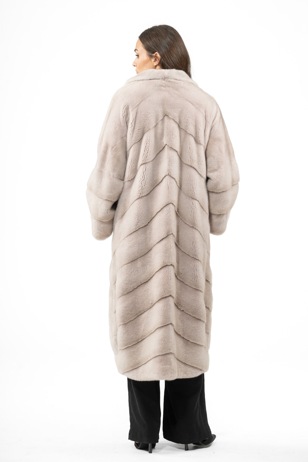 Model wearing a Powder Mink fur coat