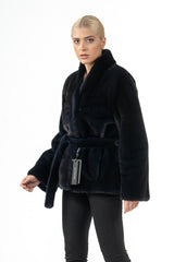 Short blue-black mink fur jacket with a high collar, long sleeves, and a matching fur tie belt at the waist.