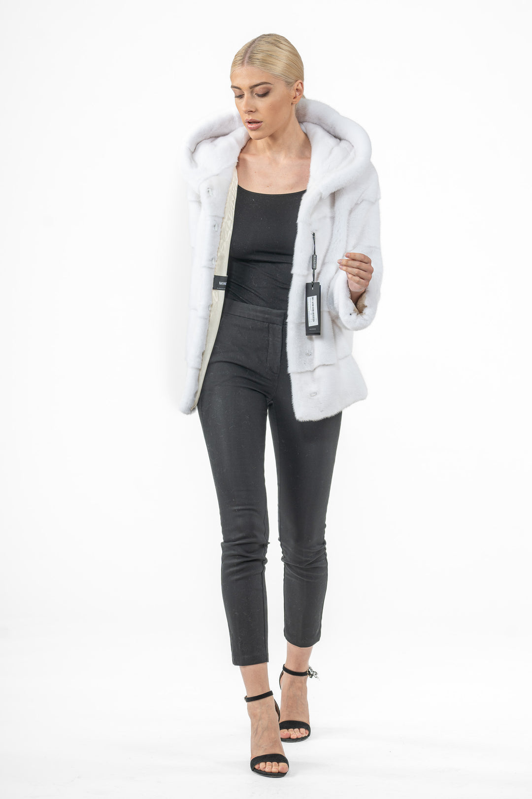 Model wearing a manzari mink fur coat
