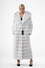 Full-length snow white chinchilla coat with horizontal fur bands and a large hood. Features a clean front silhouette and long sleeves.