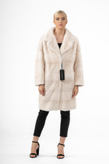 Pearl mink fur jacket featuring horizontal panels, a classic collar, and an open front, shown in full length on a white background.