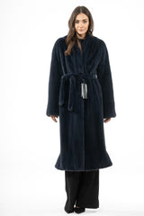A night sky dark blue mink fur coat with a shawl collar, long sleeves, and a matching fur tie belt at the waist, ending below the knees.