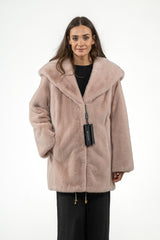 Salmon pink mink fur short jacket with a wide hood, long sleeves, and a drawstring hem featuring small gold-tone metal toggles.