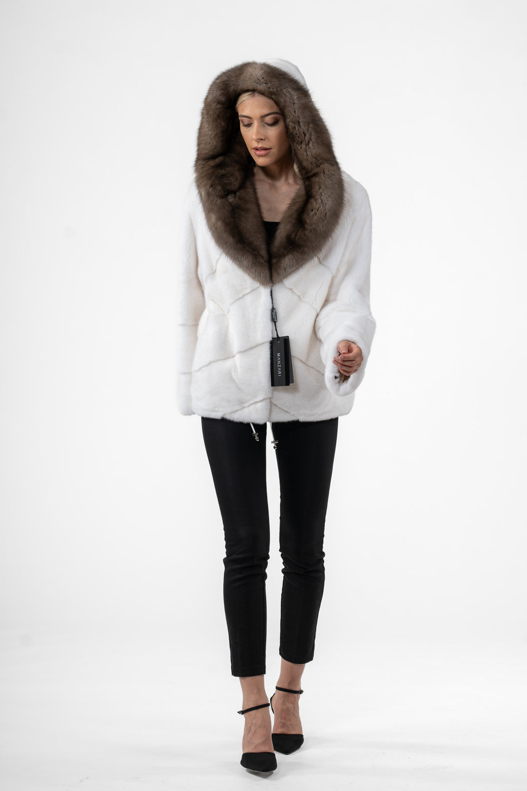 Chic White Mink fur coat by manzari for a bold statement