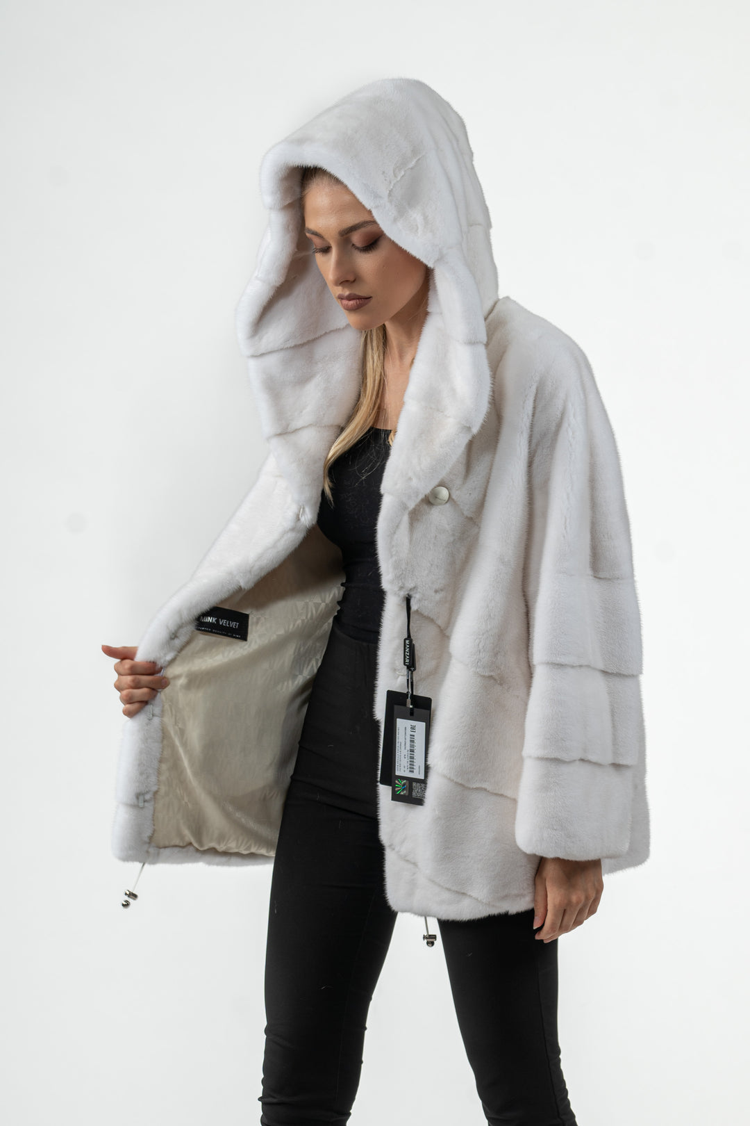 Manzari White Mink fur coat with a modern touch