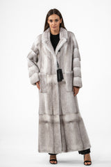 Full-length Silverblue cross mink fur coat with a notched collar, featuring large rectangular patches of dark and light-toned fur.