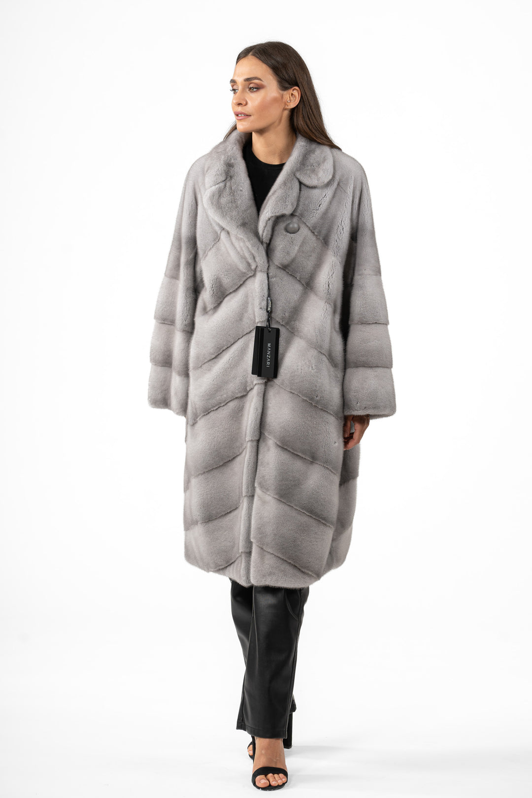 Model wearing a Sapphire Mink fur coat