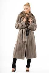 Silver blue mink fur coat with a large, darker sable fur collar, featuring a waist-cinching matching fur belt and a mid-calf length silhouette.