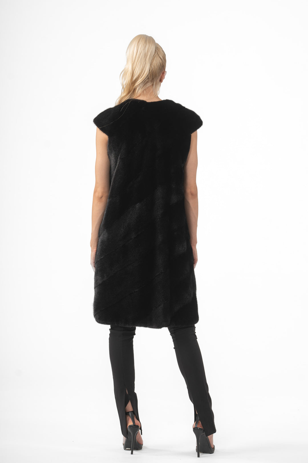 Model wearing a Black Mink fur coat