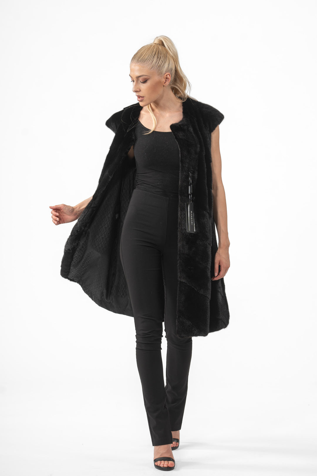 Model wearing a Black Mink fur coat