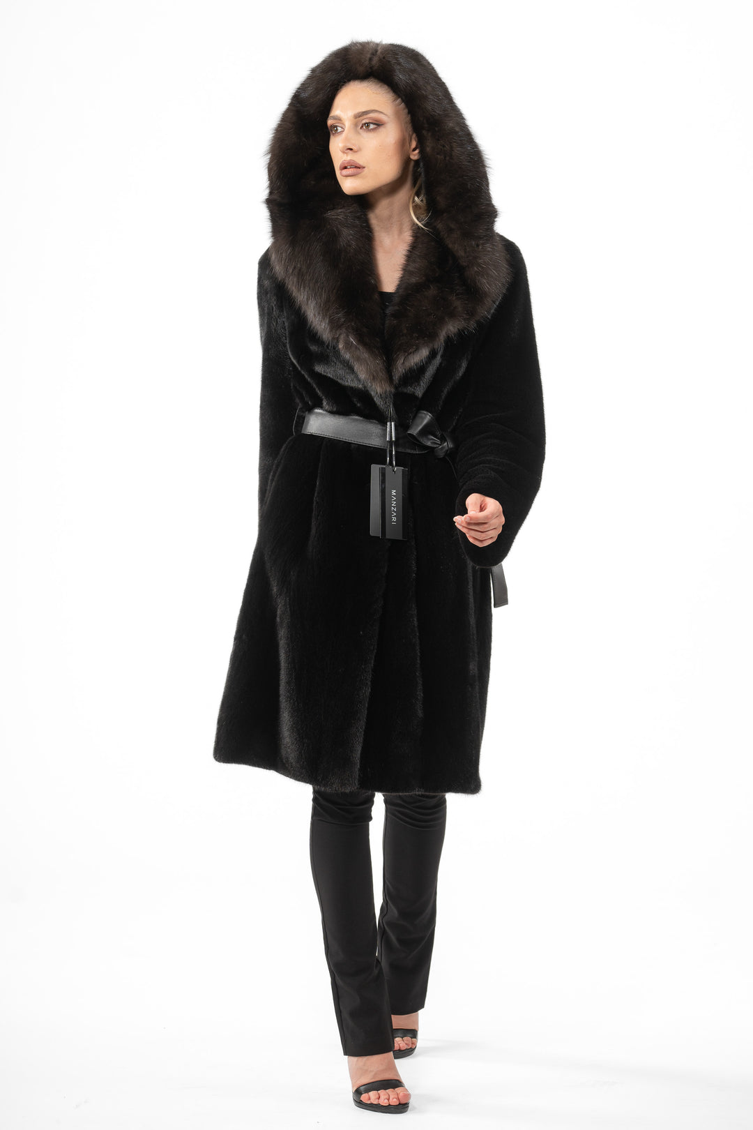 Model wearing a Black Mink fur coat