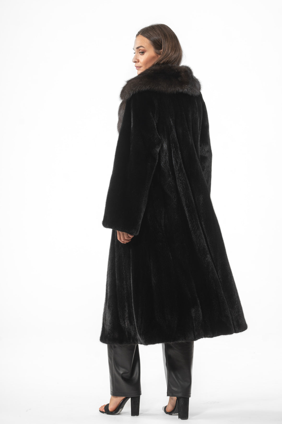 Model wearing a Black Mink fur coat