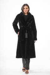 A black mink fur coat with a large lapel collar, long sleeves, and a matching fur tie belt at the waist. The coat features a calf-length cut.
