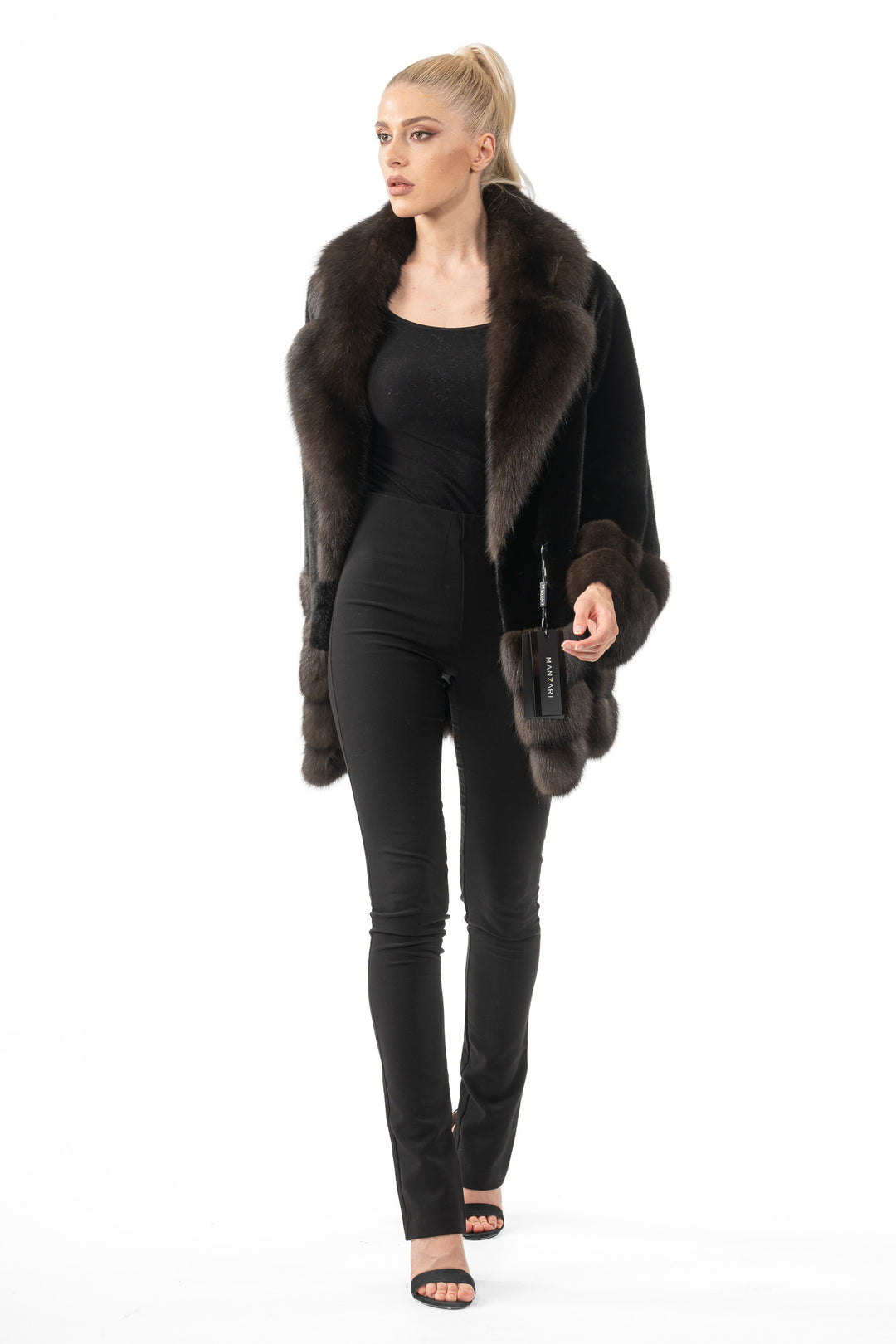 Model wearing a Black Velvet Mink fur coat