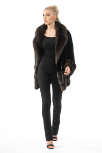 Model wearing a Black Velvet Mink fur coat