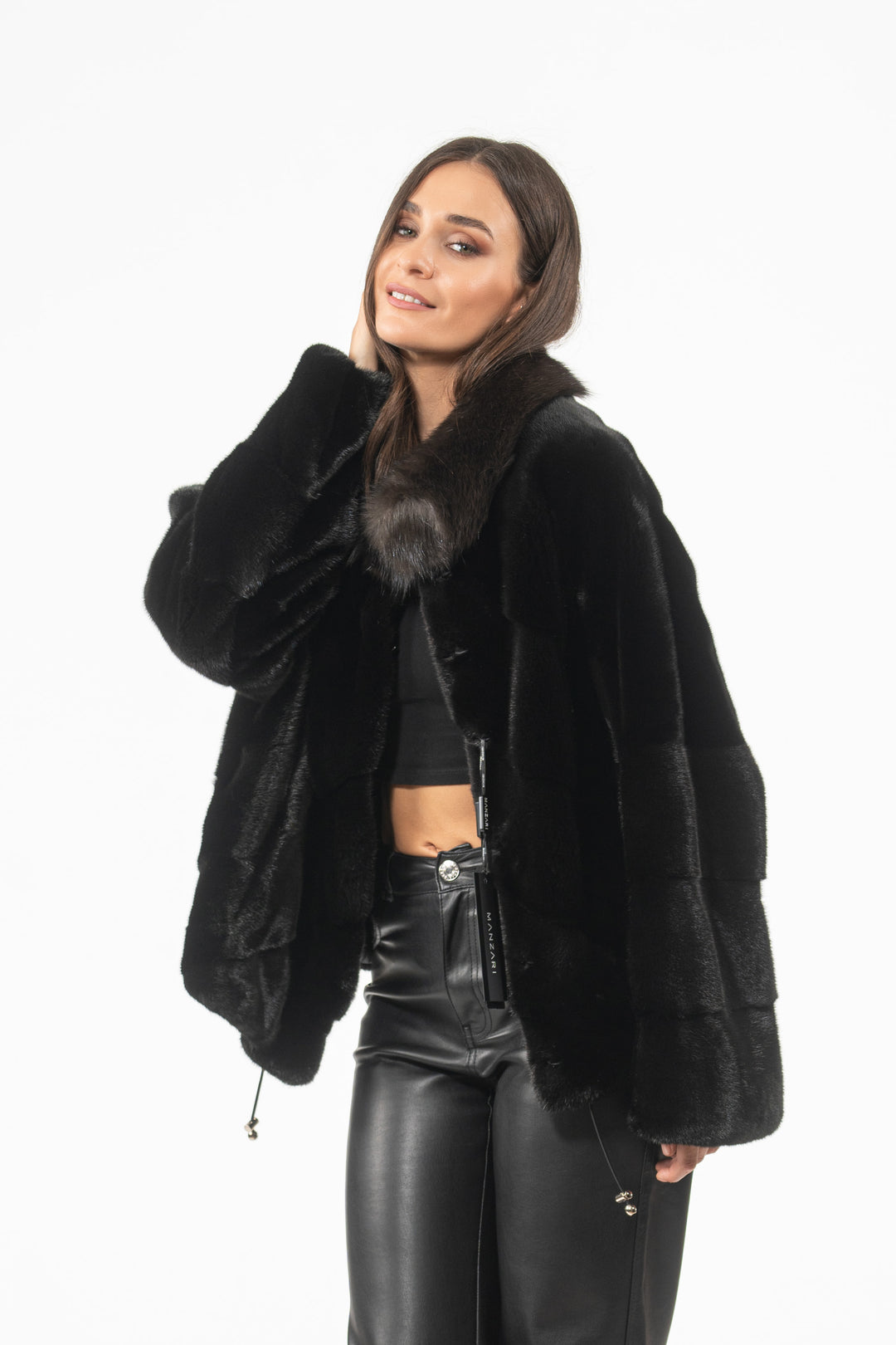 Model wearing a Black Velvet Mink fur coat