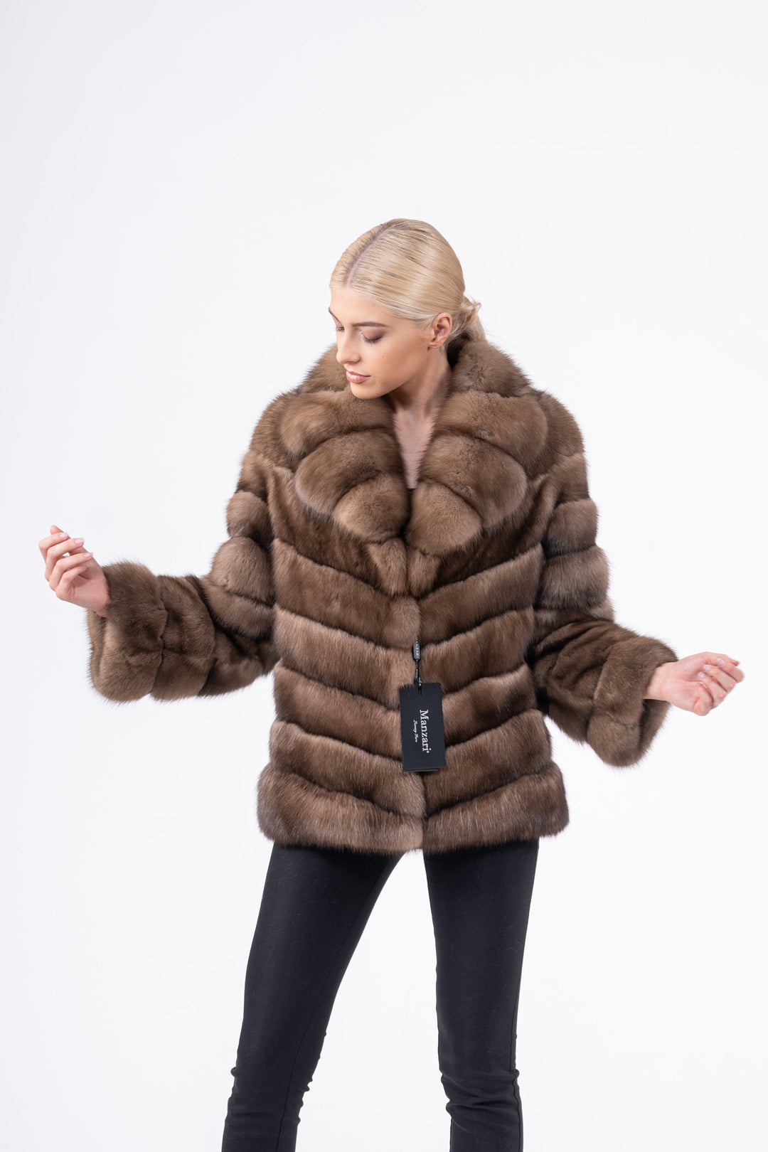 Model wearing a Lavander Russian sable fur coat by manzari