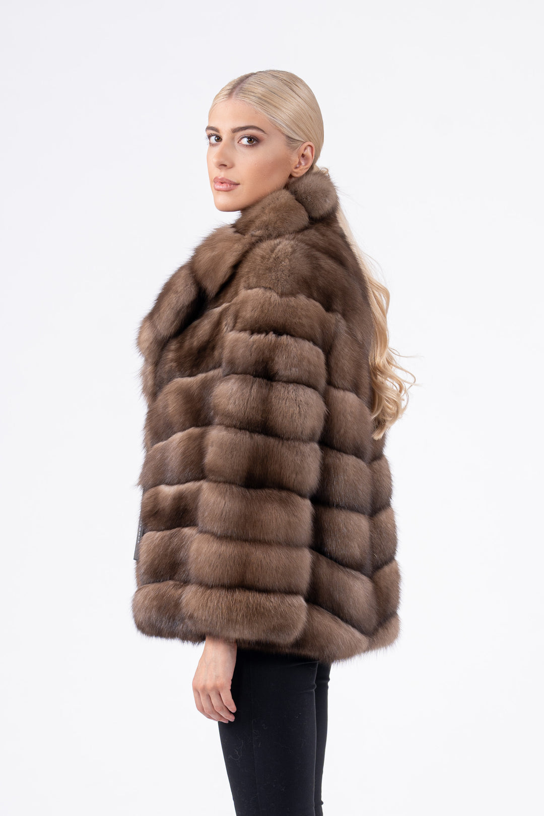 Model wearing a Lavander Russian sable fur coat by manzari