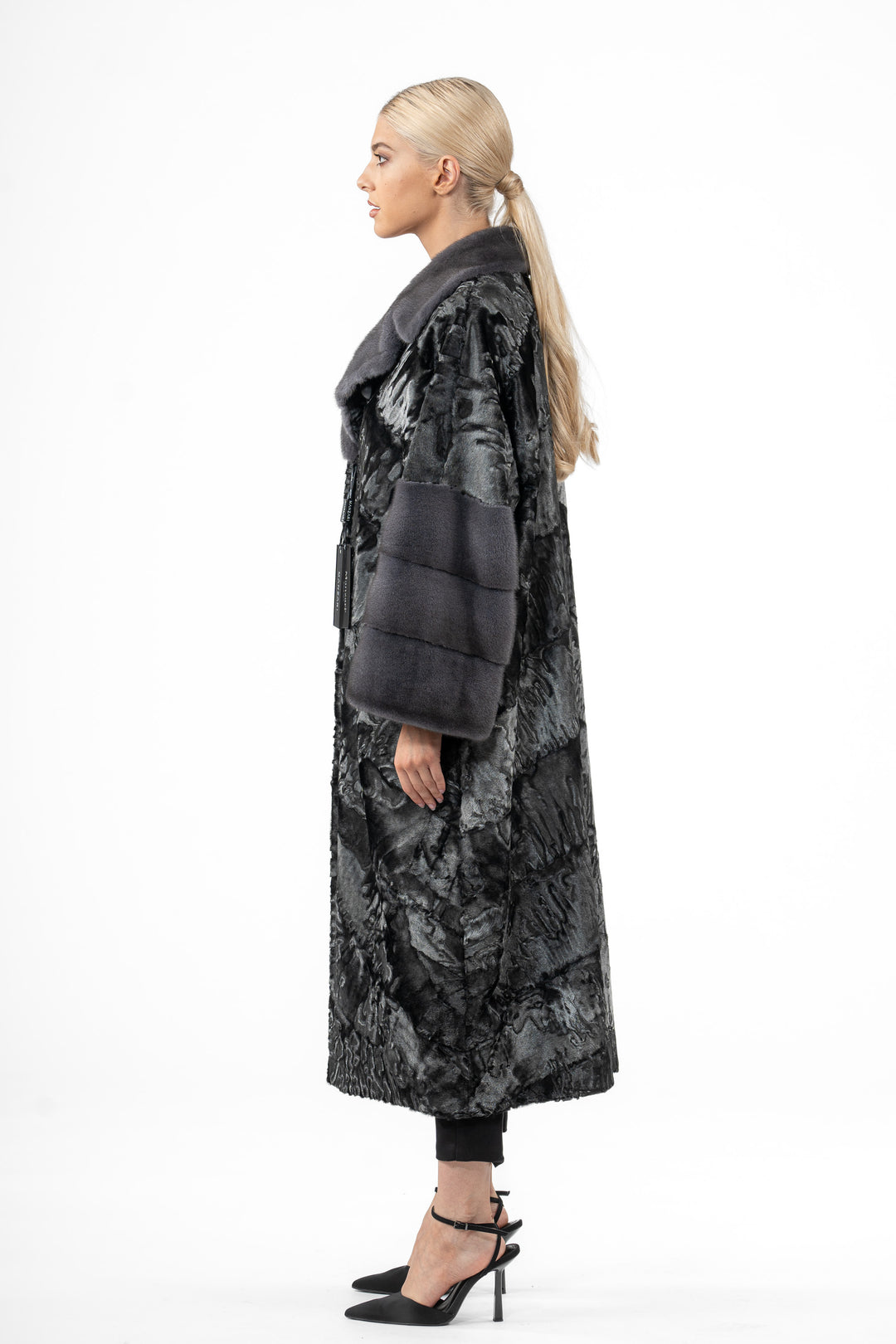 Manzari Black Swakara fur coat with intricate details