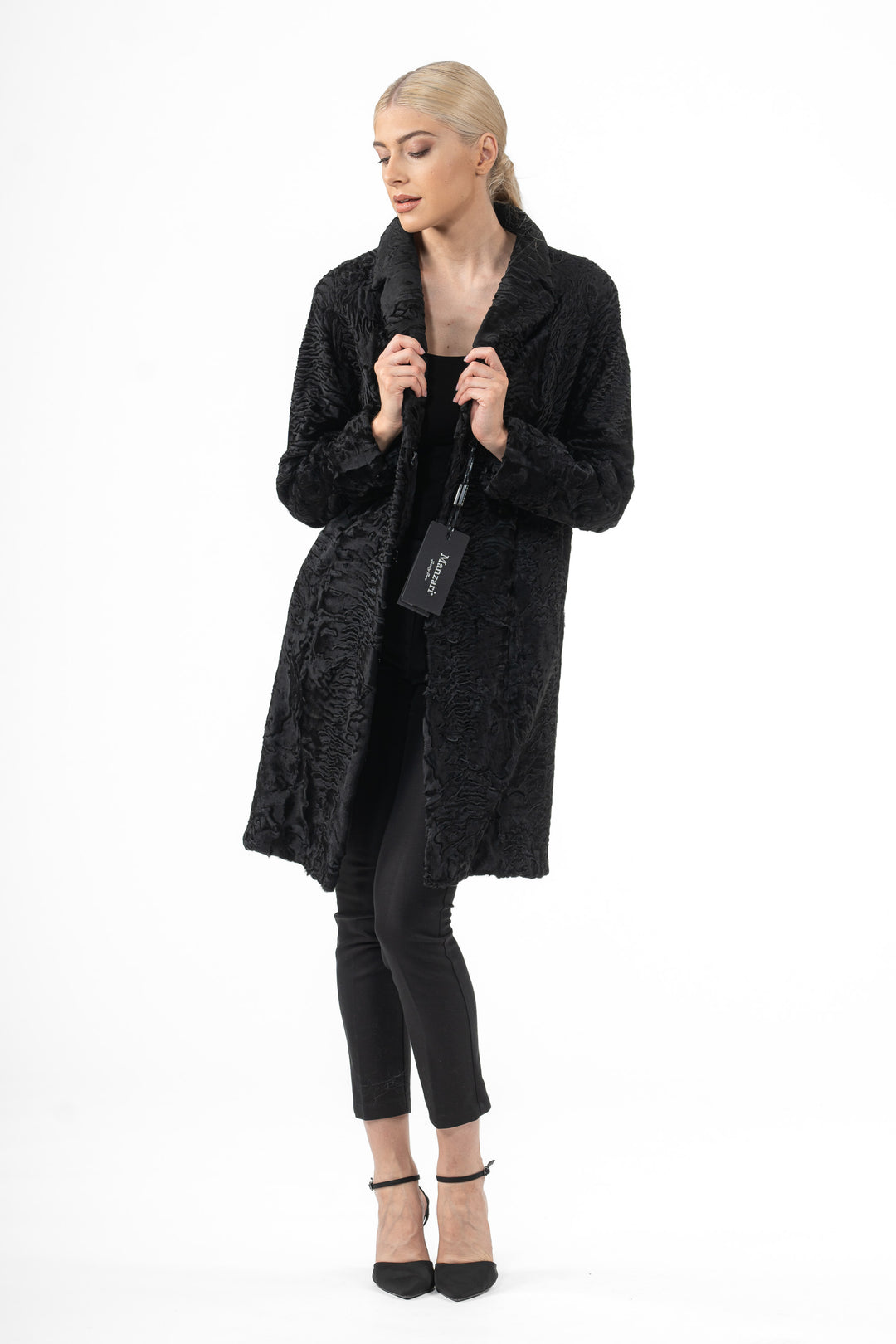 Manzari Black Swakara fur coat for a bold look