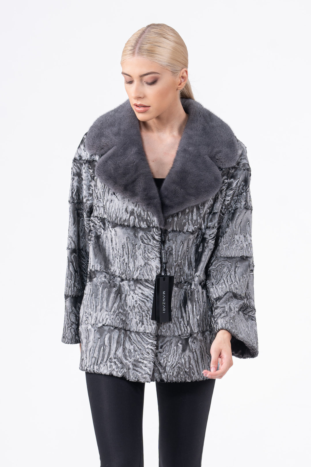 Manzari Black Swakara fur coat for a bold look