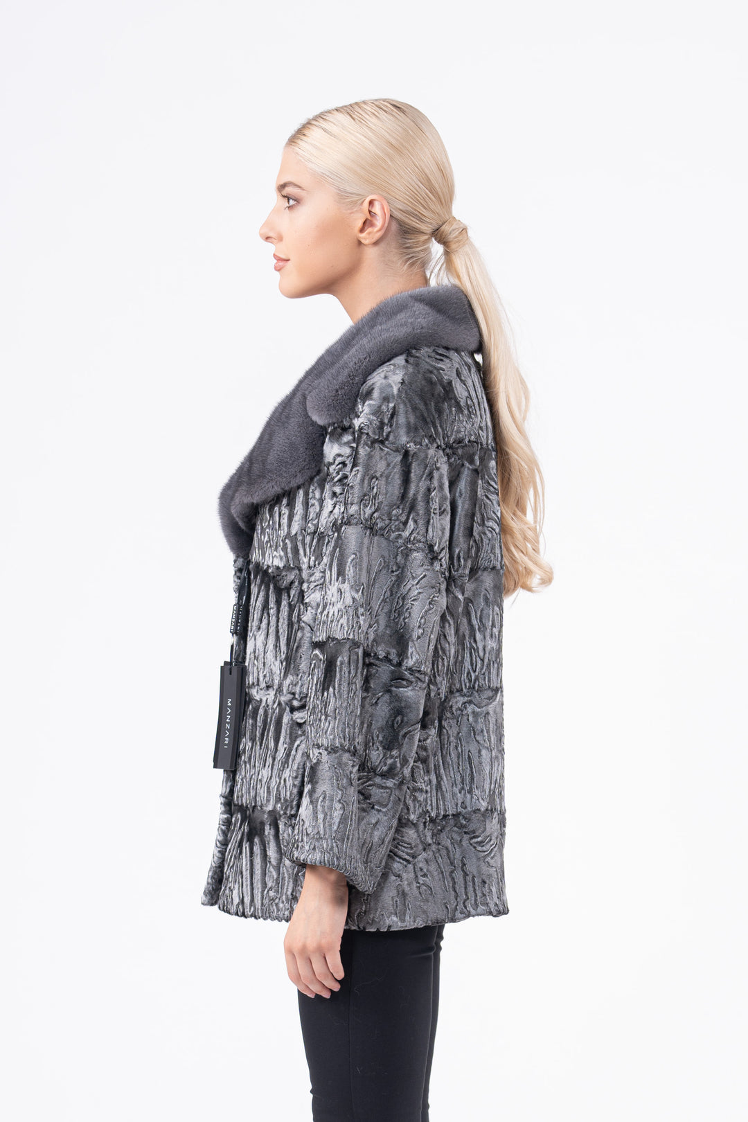 Manzari Black Swakara fur coat with intricate details