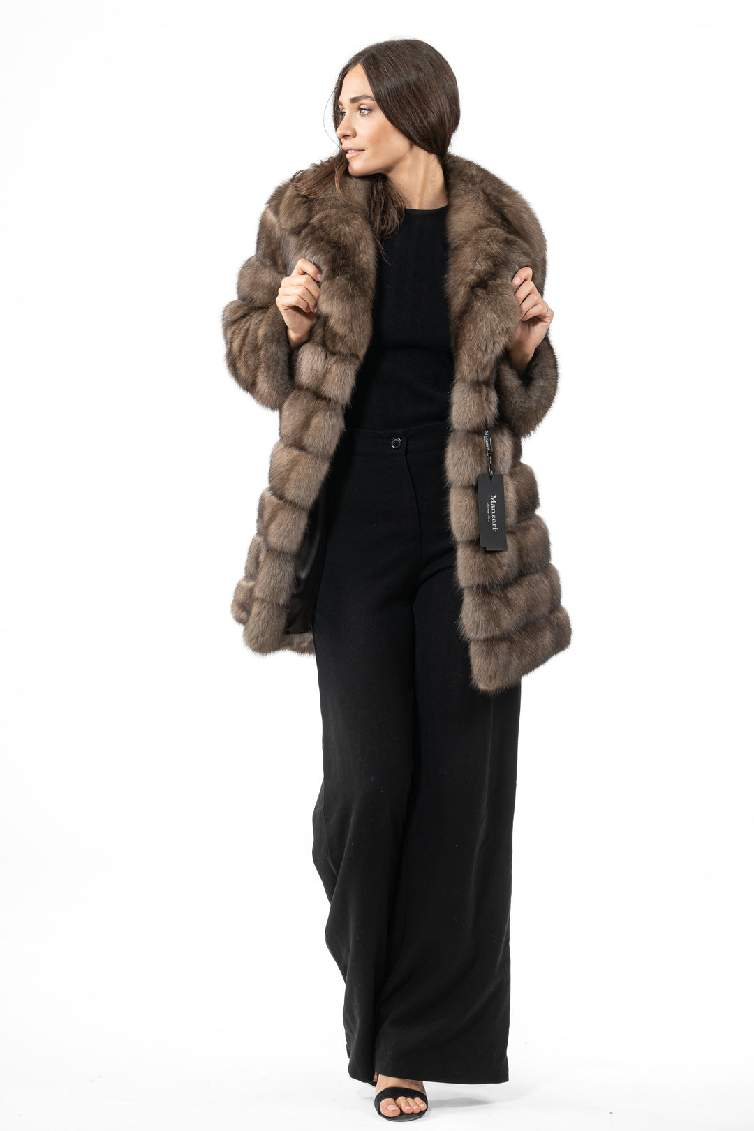 Luxurious Platinum Russian sable fur coat on display