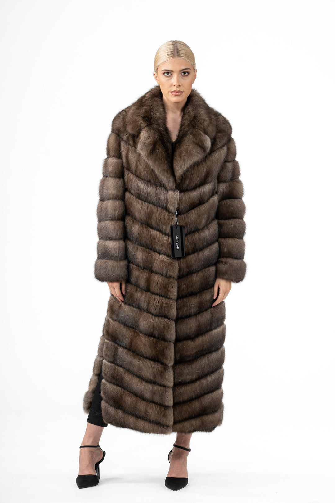 Luxurious Platinum Russian sable fur coat on display