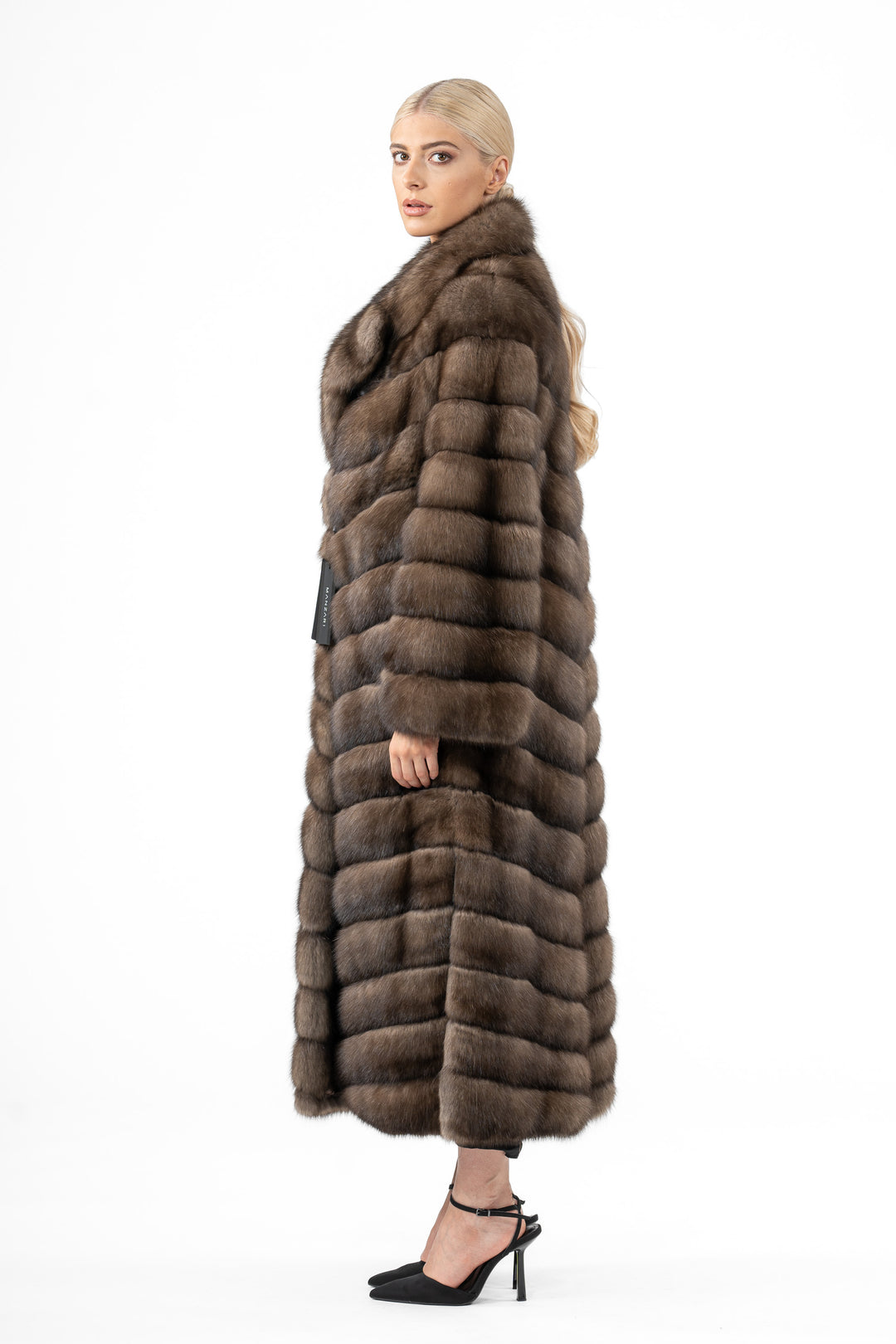 Model wearing a Platinum Russian sable fur coat by manzari