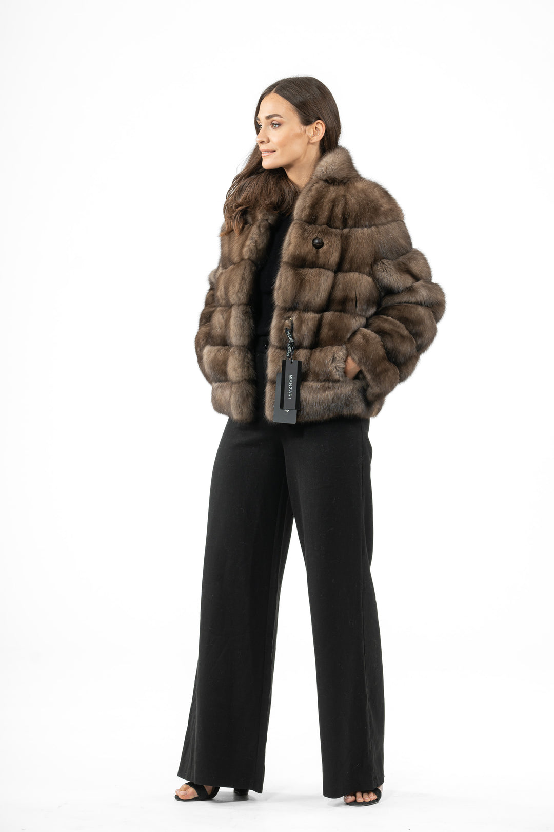 Luxurious Platinum Russian sable fur coat on display