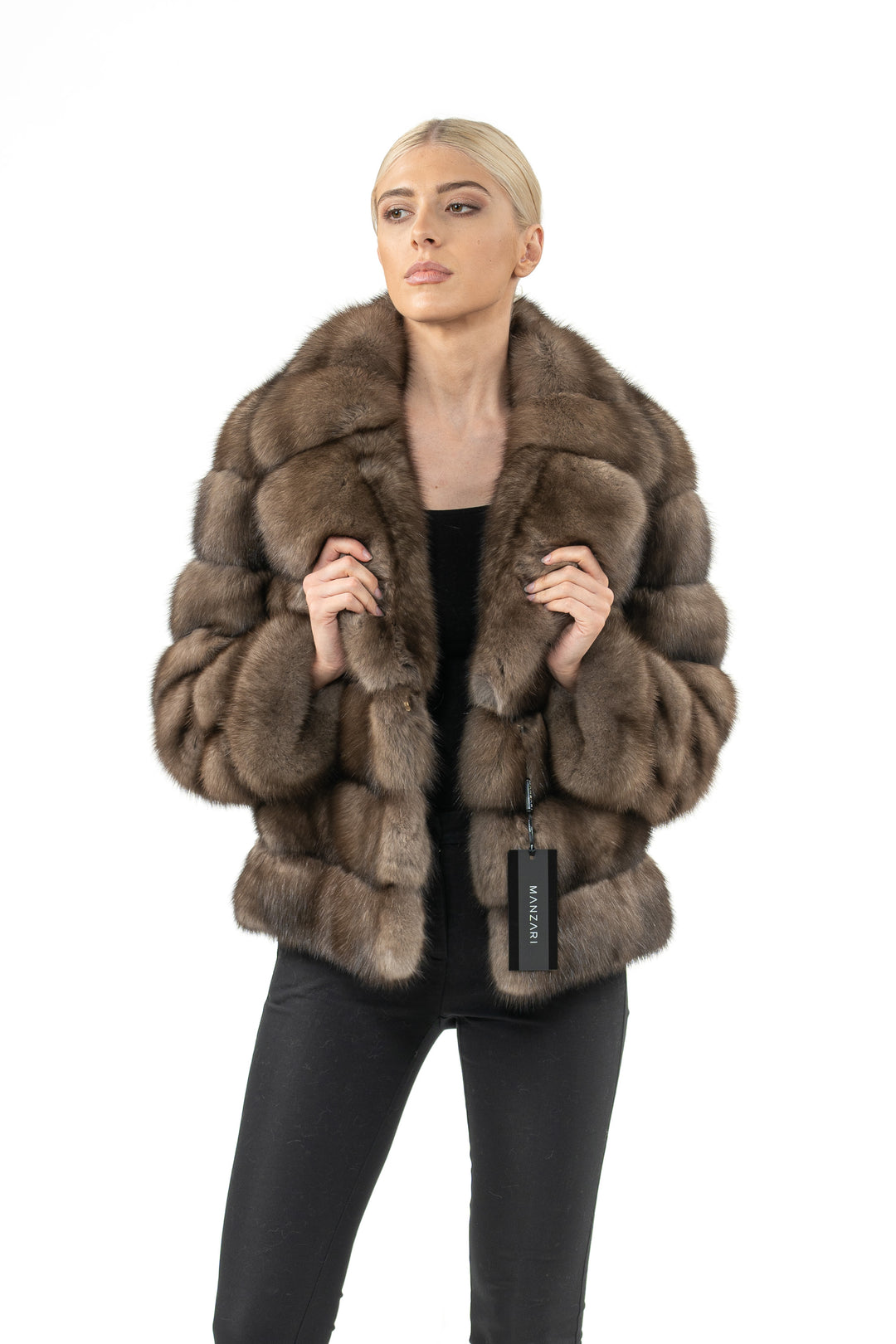 Model wearing a Platinum Russian sable fur coat by manzari