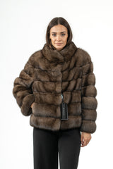 Short Russian sable jacket in brown with horizontal fur panels, a round neckline, and a clean, boxy silhouette.