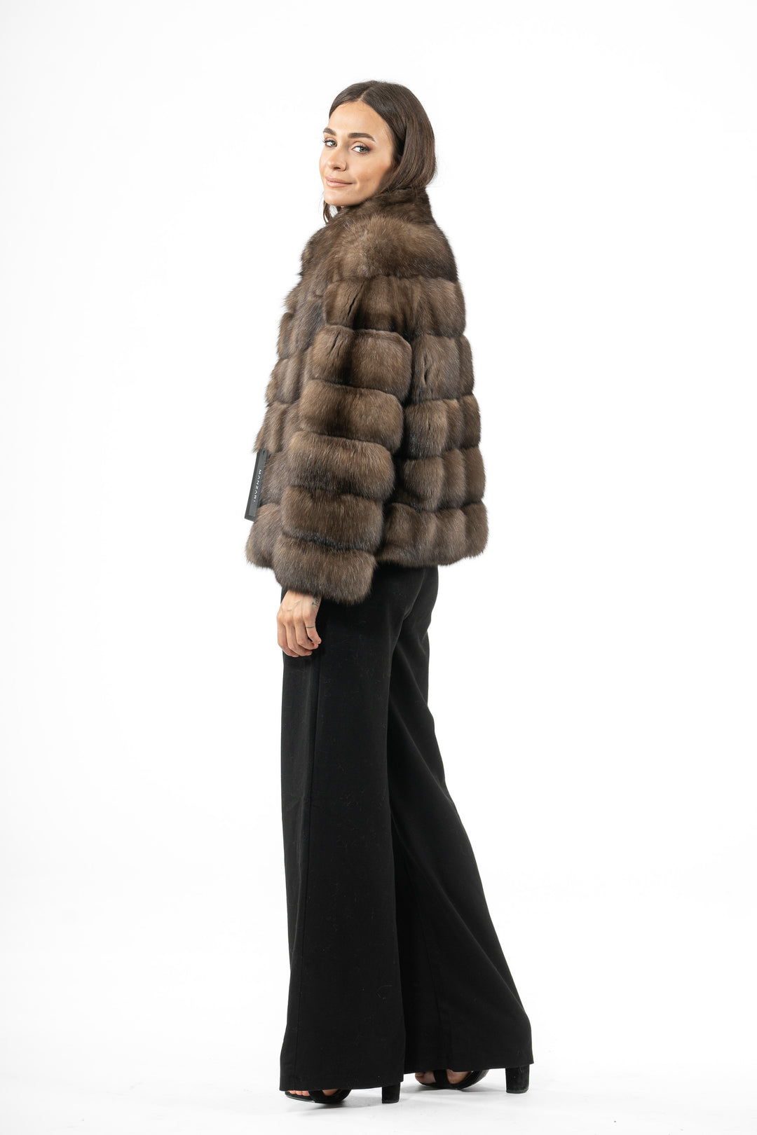 Model wearing a Platinum Russian sable fur coat by manzari