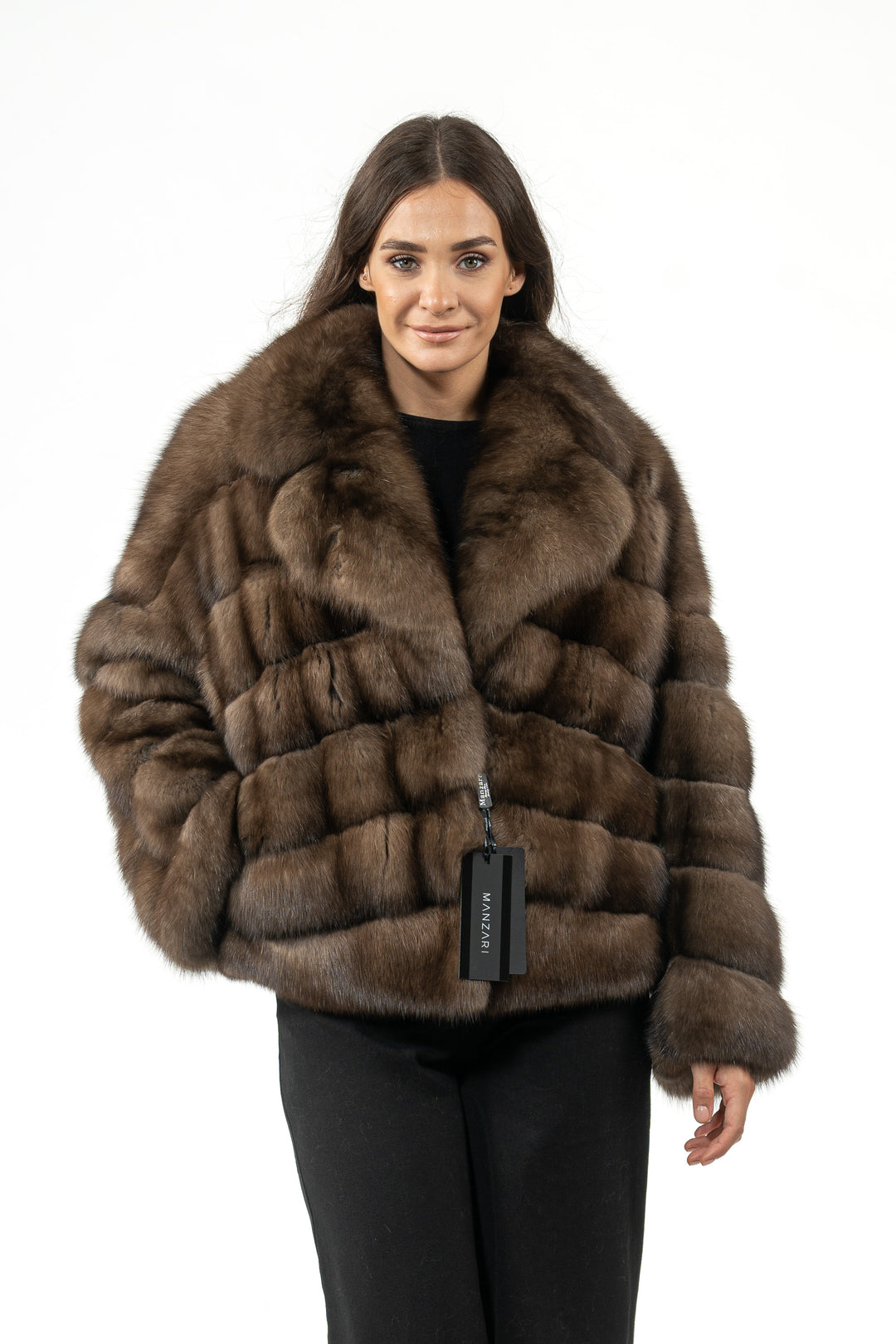 Luxurious Platinum Russian sable fur coat on display