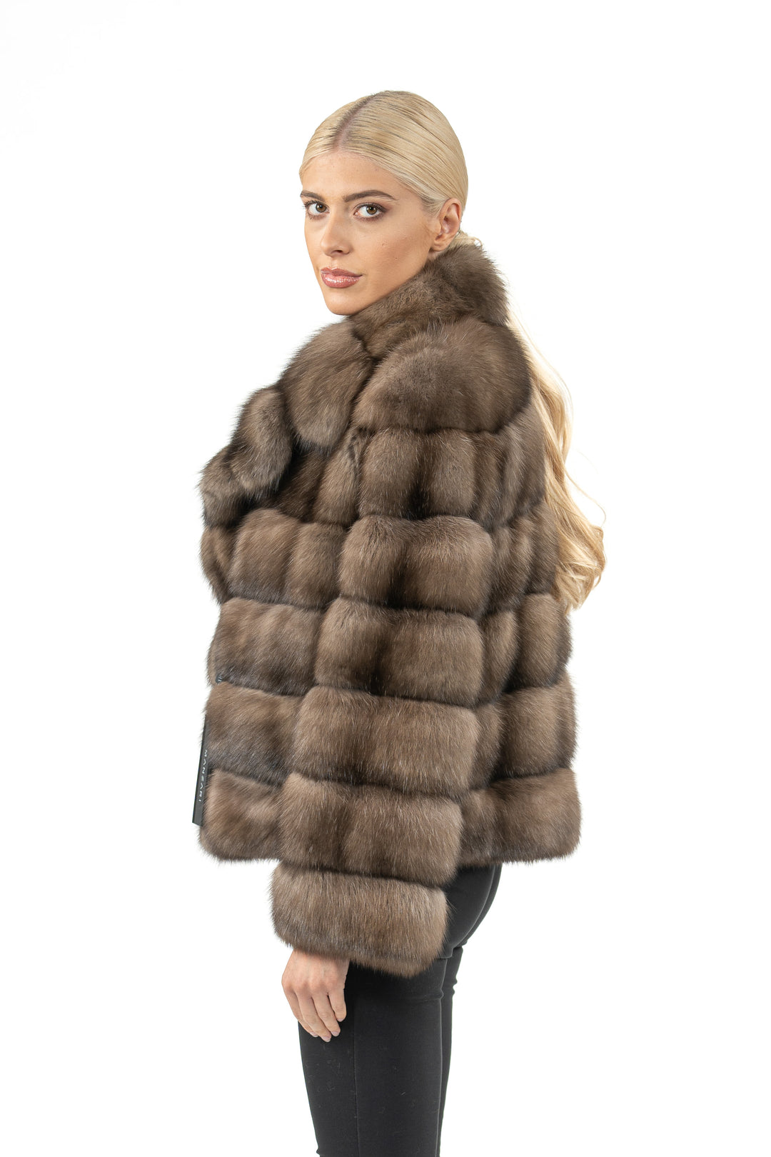 Model wearing a Platinum Russian sable fur coat by manzari