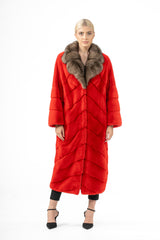 Long red mink fur coat featuring a V-chevron pattern and a large, wide collar in a contrasting brown fur.