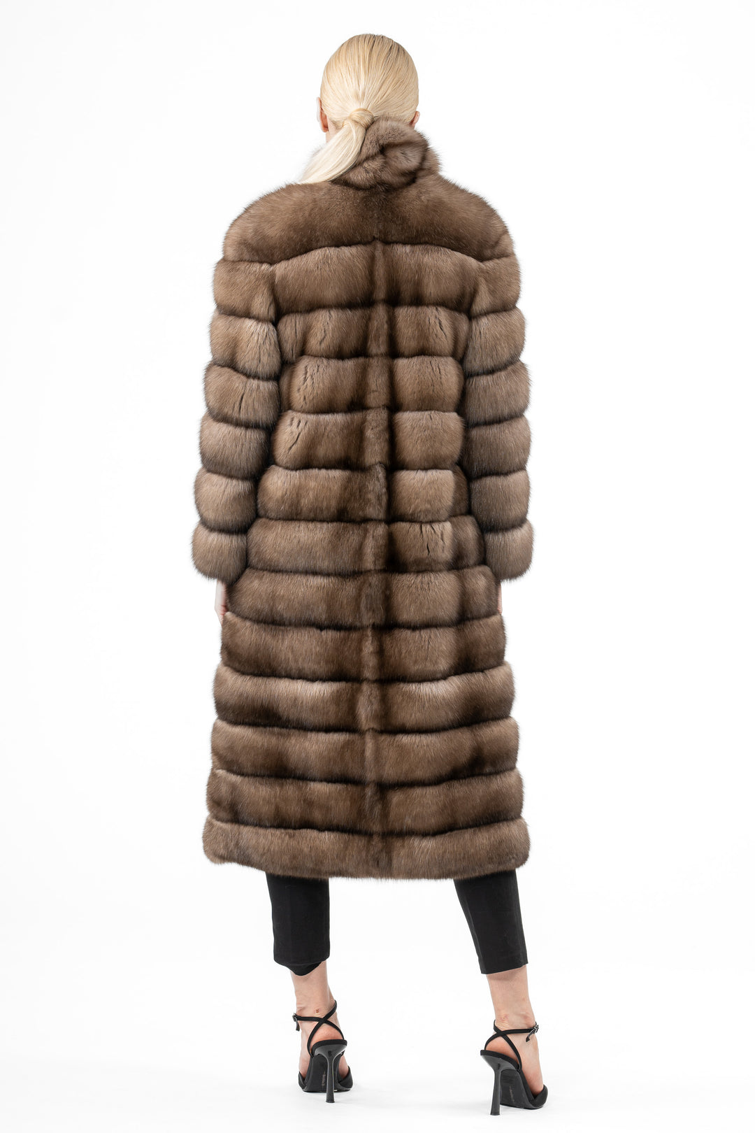 Model wearing a Lavander Russian sable fur coat by manzari