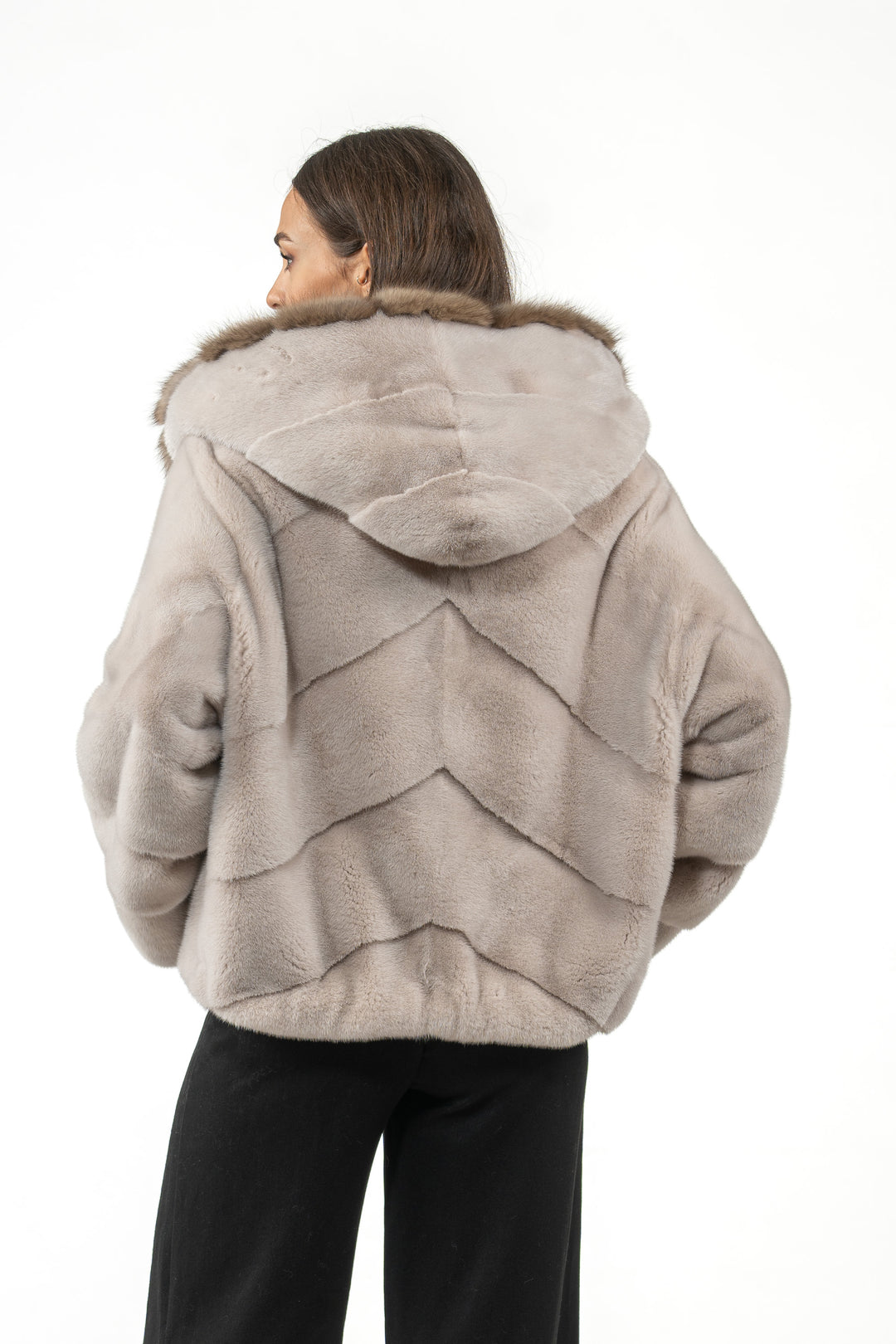 Model wearing a Powder Mink fur coat