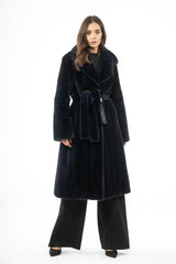 A blue black mink fur coat features a wide notched collar, straight sleeves, and a matching fur tie belt at the waist.