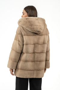 Model wearing a Palomino Mink fur coat