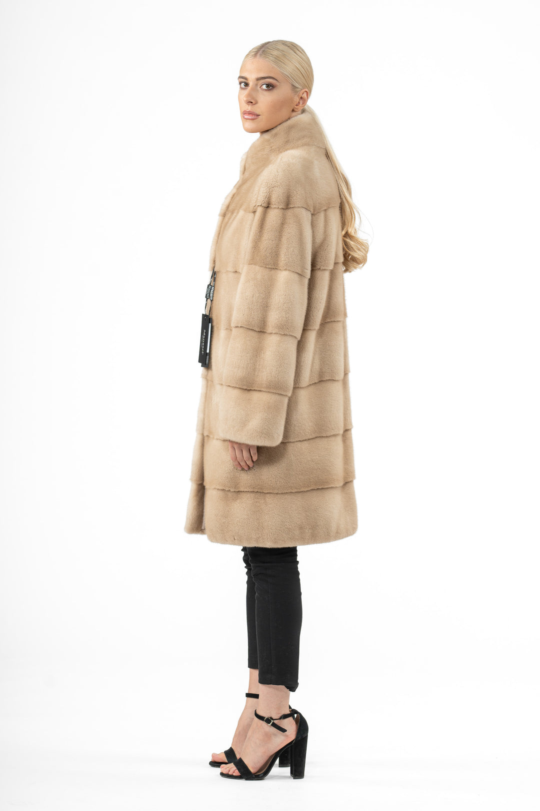 Model wearing a Palomino Mink fur coat