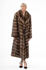 Russian sable coat in a warm brown tone with a V chevron pattern. Features a wide collar, long sleeves, and a long hemline.