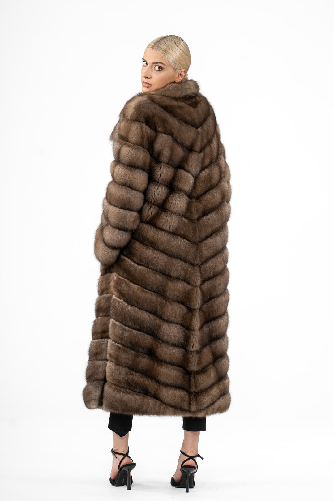 Luxurious Lavander Russian sable fur coat on display