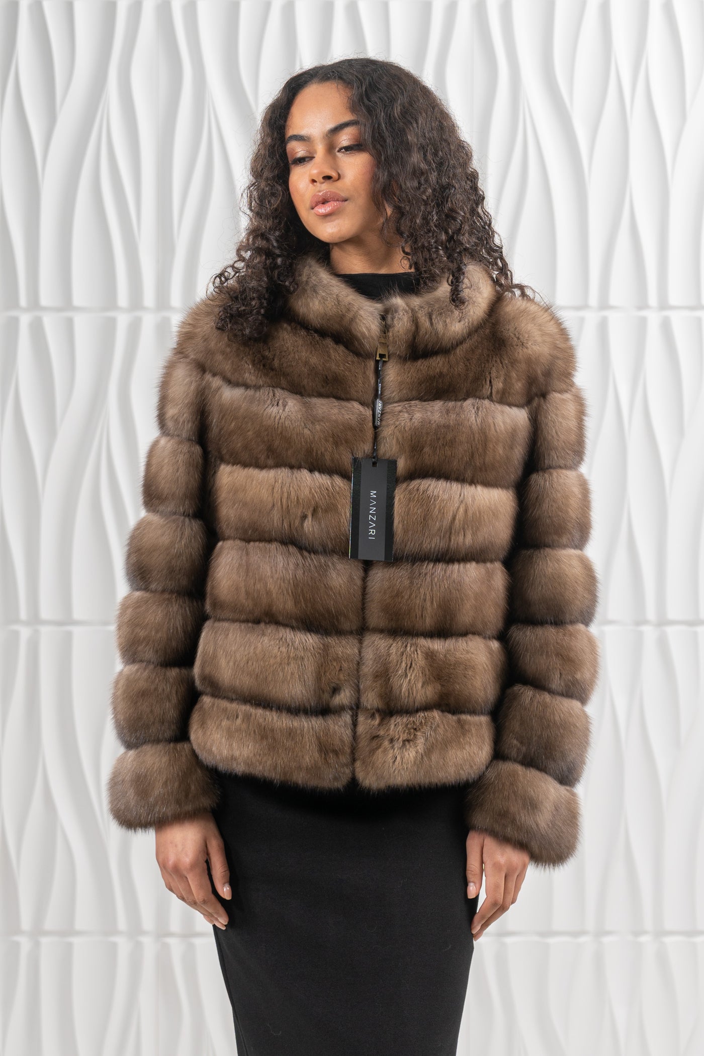 Model wearing a manzari russian sable fur coat by manzari