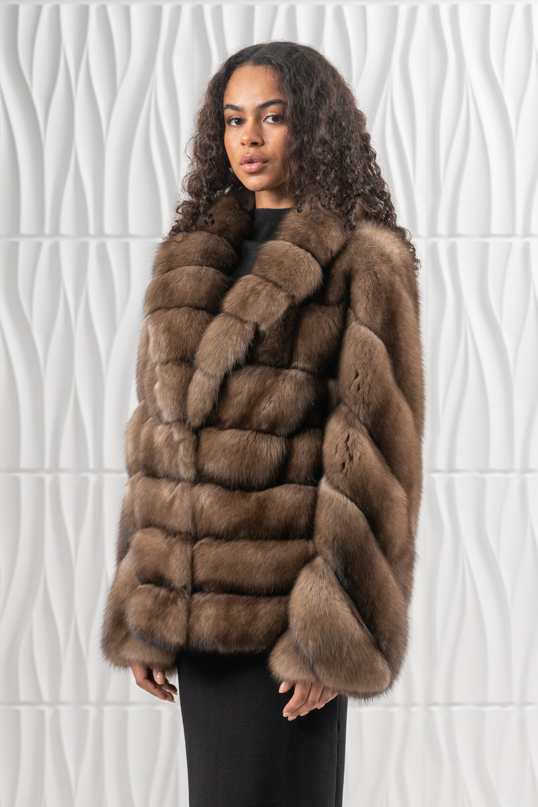 Model wearing a Platinum Russian sable fur coat by manzari