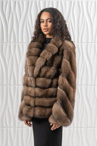 Model wearing a Platinum Russian sable fur coat by manzari