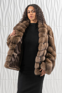 Luxurious Platinum Russian sable fur coat on display